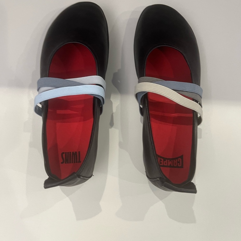 Size 5 Camper Black Flats with Blue and White Straps. No box. New without tags.